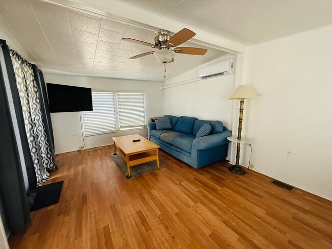 Building Photo - Beautiful fully furnished one bedroom, one bath manufactured home in a 55+ deed restricted gated ...
