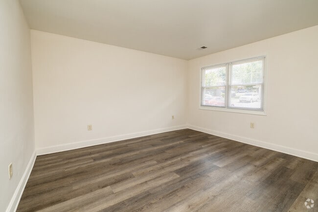 3BR,1.5BA - 1080SF - Living Room - Windsor Valley Apartments