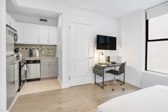 Foto del edificio - National at 888 6th Ave Furnished Apartments