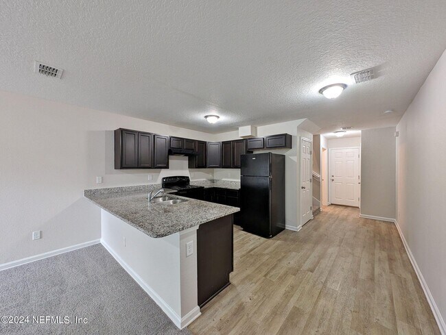 Building Photo - 8470 McGirts Village Ln