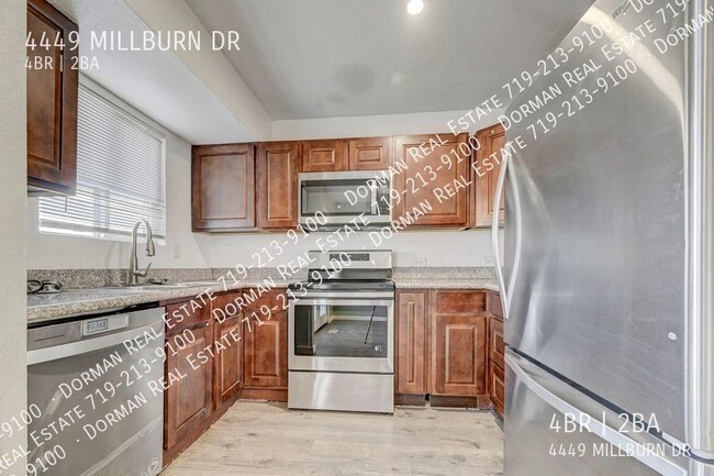 Building Photo - Four bedroom home close to Ft. Carson, Lar...