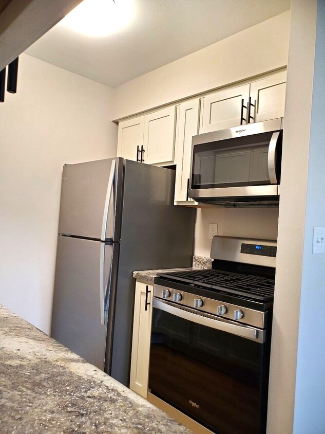 Unit #102 kitchen - Dolphin Square Apartments