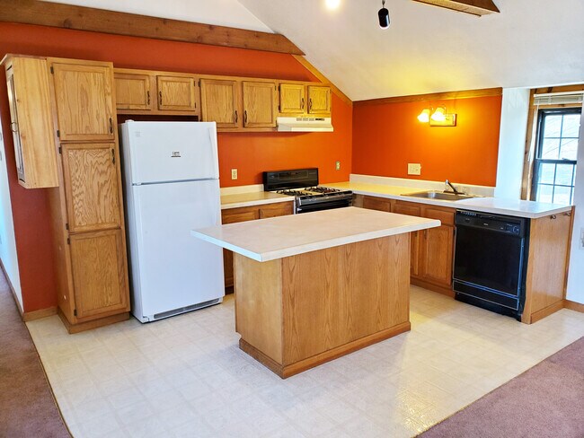 AMPLIA ZONA DE COCINA CON ISLA CON CAPACIDAD PARA 6 PERSONAS - 27 Richmond St