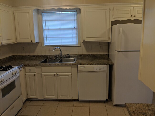 Building Photo - Spacious four Bedroom Home Available NOW