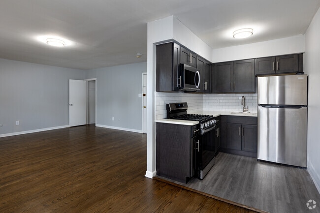 2HAB, 1BA - 900SF Sala de estar y cocina - Barry Court Apartments