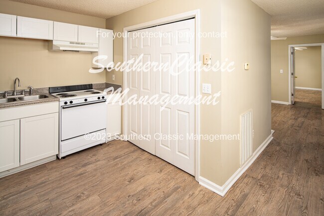 KITCHEN WITH LAUNDRY CLOSET - 431 S Elbert St