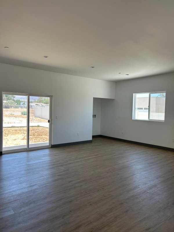 Building Photo - 9228 E Ave T 6