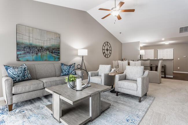 Living Room with Ceiling Fan - Bedford Place Apartments