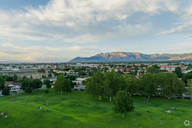 The sun sets over UNM and colors the Sandia Mountains once last time as the day ends.