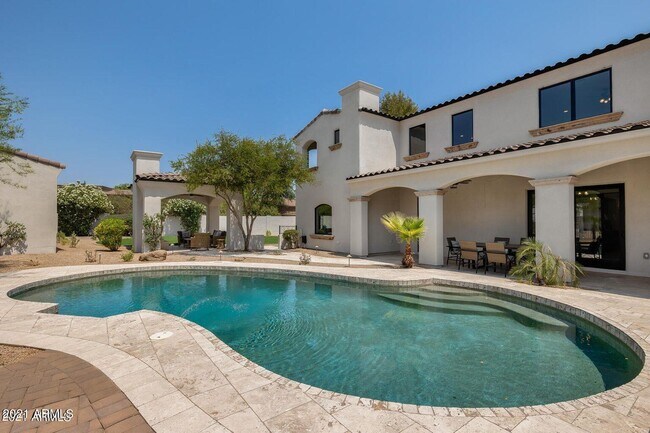 Building Photo - 10076 E Paradise Dr