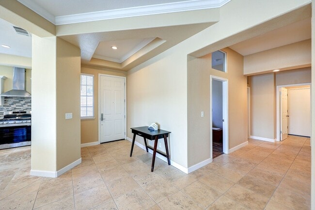 Building Photo - OPEN FLOOR PLAN WITH SIDEYARD PARKING AND WONDERFUL REAR DECK WITH OVERHANG