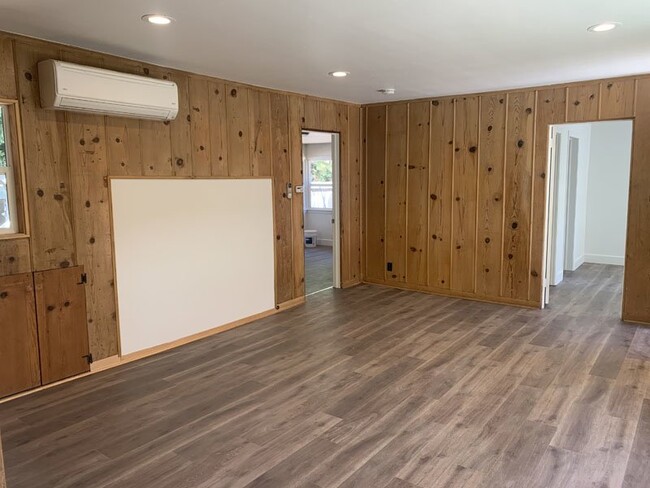 Building Photo - Recently remodeled home located behind sto...