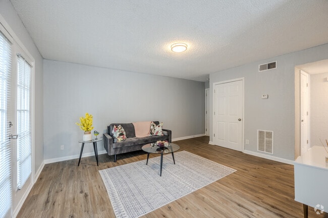 1BR, 1BA - 818SF - Living Room - Woodside Village