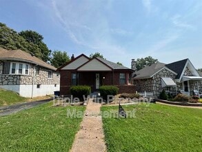 Building Photo - 6905 Woodrow Ave