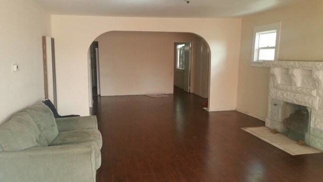 Open Floor Plan Living and Dining Room - 3871 E 5th St