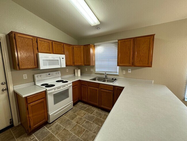 Building Photo - 3 Bedroom - 2 Bath - 1395 Sq. Ft. Home in ...