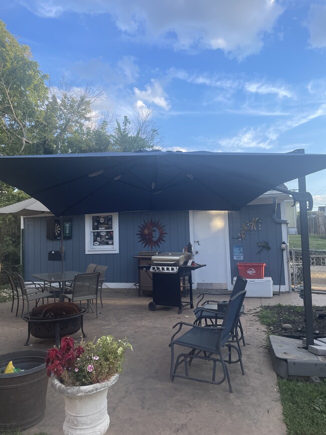 Patio by the detached garage and 2 car driveway - 1803 Courtland Ave