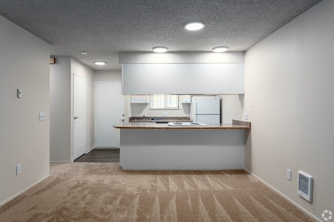 Una habitación, cocina - Trailwood Apartment Homes