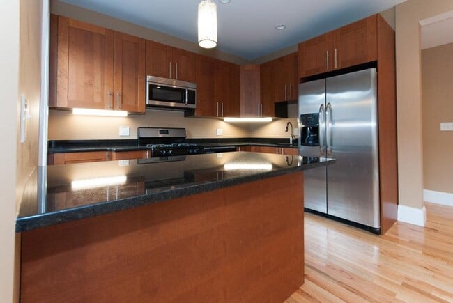 Photo - Renovated 5-Bedroom • 2 Baths • A/C • In-Unit Laundry • 1,400 Sq Ft House
