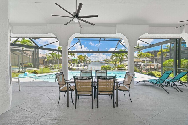 Building Photo - NOW AVAILABLE - Waterfront Pool Home w/ Bo...