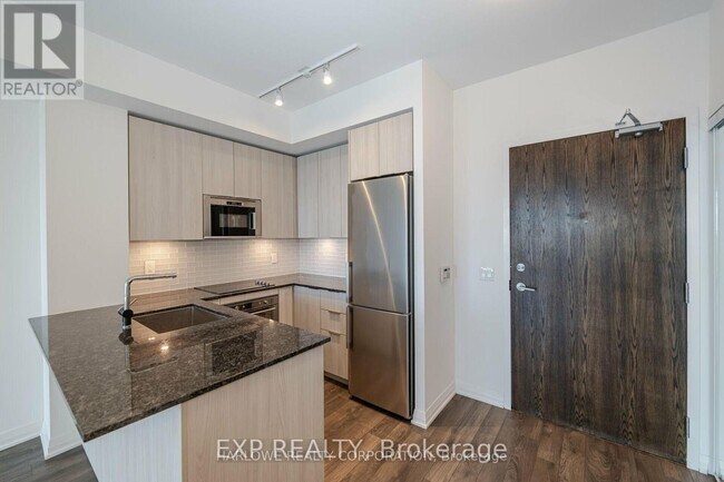 Photo du bâtiment - 99 Eagle Rock Way