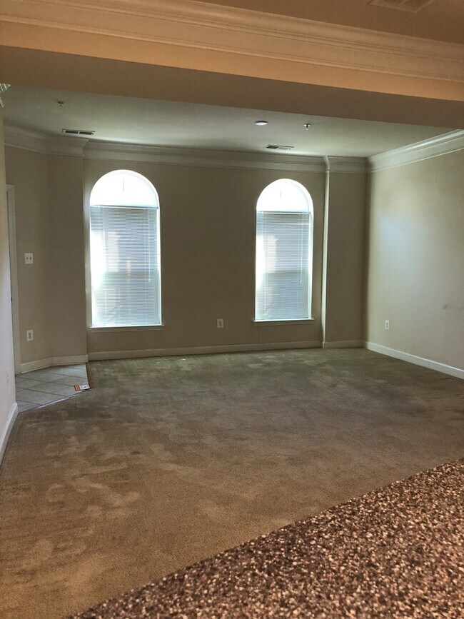 Building Photo - 2 Level Townhouse/condo with one car garage in the Watkins Mill Town Center