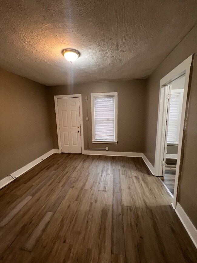 Building Photo - Fully Renovated 5-Bedroom, 2-Bath Single-Family — Driveway + Water, Sewer & Trash Covered