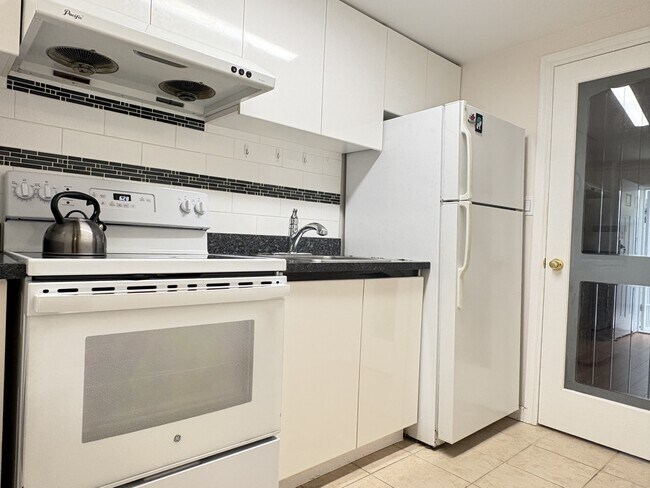 Photo du bâtiment - 117 W 42nd Ave