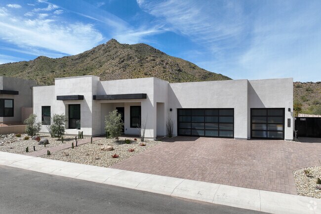 Modern custom homes can be seen right at the base of San Tan Mountain.