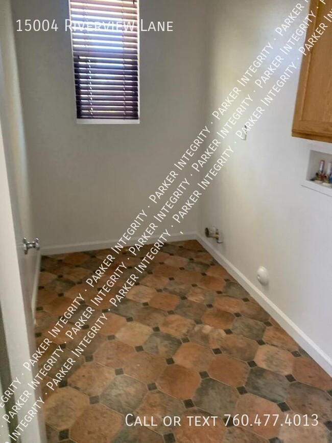 Foto del edificio - 15004 Riverview Ln