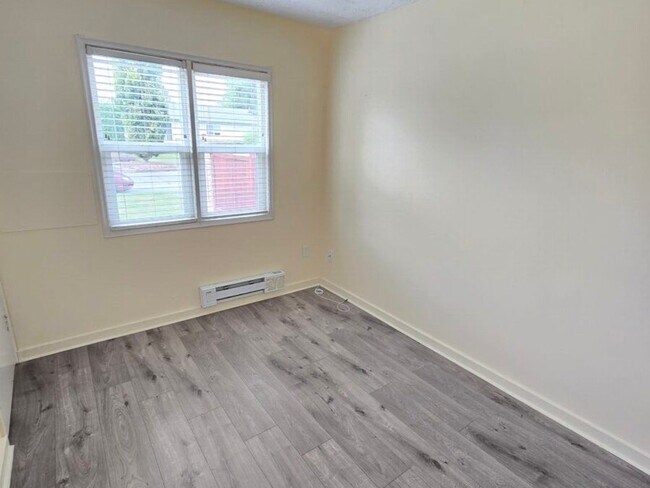 Photo du bâtiment - 2 Bedroom Duplex