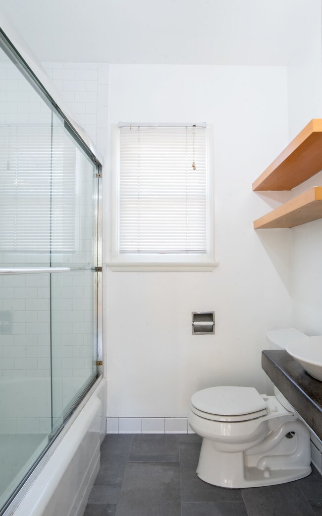 Bathroom - new floors/tile - 3555 Beethoven St