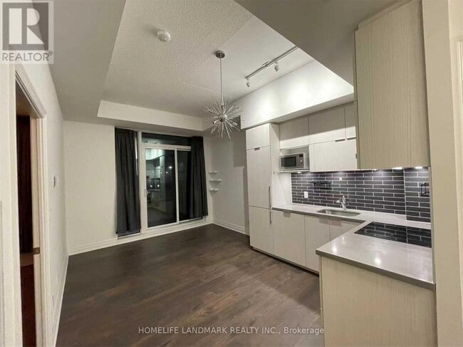 Building Photo - 10-4010 Rouge Valley Dr W
