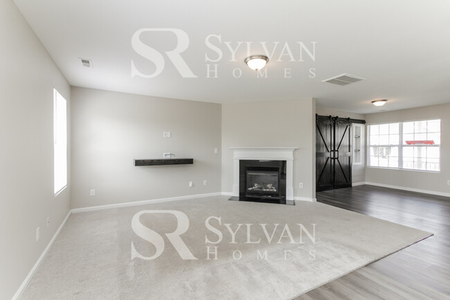 Building Photo - Enjoy living the good life in this 4 bedro...