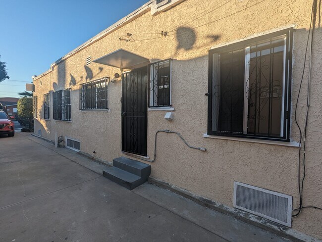 Side view of apartment - 6730 Stafford Ave
