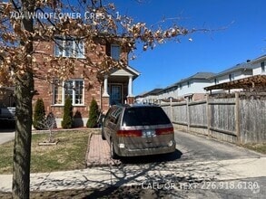 Building Photo - 704 Windflower Crescent