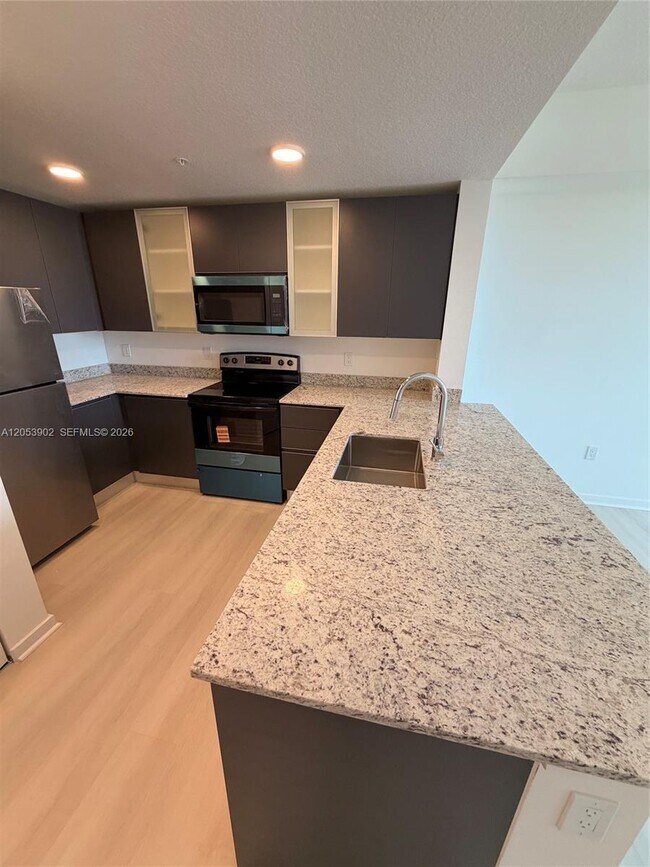 Building Photo - 5563 Millennia Park Dr