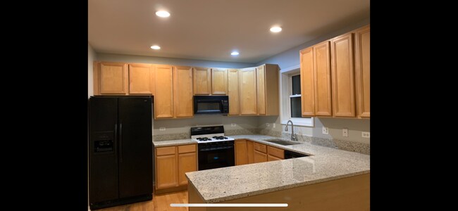 Kitchen loaded with storage - 1241 N Maplewood Ave