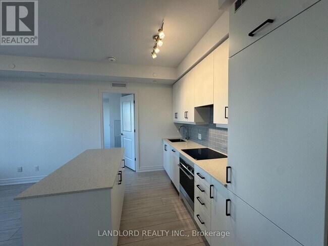 Building Photo - 30-1230 Elm Dr W