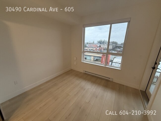 Photo du bâtiment - 1 Bed + Den Condo at Highstreet Village