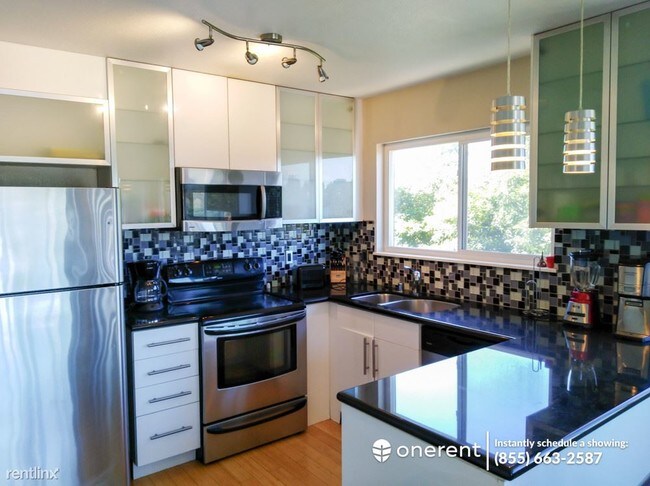 Foto del edificio - 2 br, 1 bath Apartment - 8009 Greenridge Dr