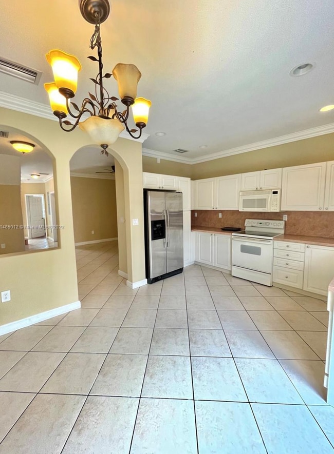 Building Photo - 5590 NW 107th Ave