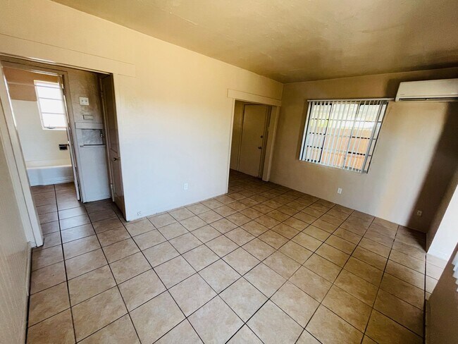 Building Photo - Two Bedroom w/ A/C, Yard and Carport - 500...