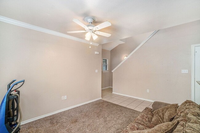 Building Photo - Beautiful two story townhome, crown molding, granite countertops, stained cabinets and carpeting ...