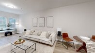 Located at 66 Hawthorne Dr in Bedford, NH, this thoughtfully designed 2-bedroom, 2-bathroom residence offers a clean, modern aesthetic across a single-floor layout. The open living room features light hardwood-style flooring, neutral walls, and ample space for comfortable seating arrangements, creating a bright and welcoming atmosphere. A dedicated entrance provides a smooth transition into the main living areas.

The kitchen is efficiently designed with white shaker cabinetry, granite countertops, and a full suite of stainless steel appliances, including a range, microwave, dishwasher, and refrigerator — offering both style and practicality.

Both bedrooms are carpeted and finished in soft neutral tones. The primary bedroom features windows with natural light and views of the surrounding greenery, while the second bedroom is equally comfortable with its own window and closet access.

Each bathroom is finished with tile flooring, granite-topped vanities, and walk-in shower stalls equipped with safety grab bars and curtain rods — a detail that adds both accessibility and convenience. The warm, neutral palette carried throughout the bathrooms creates a calm, spa-like feel.

Overall, this residence delivers a cohesive, modern living experience with practical finishes and a clean, understated design throughout.