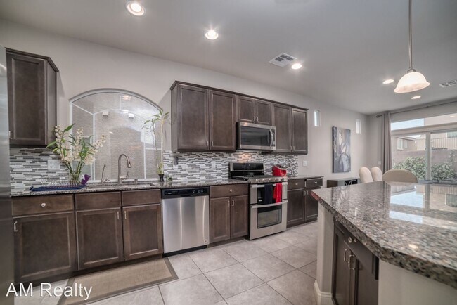 Foto del edificio - 4 br, 2.5 bath House - 5937 Azzura Palms Ave