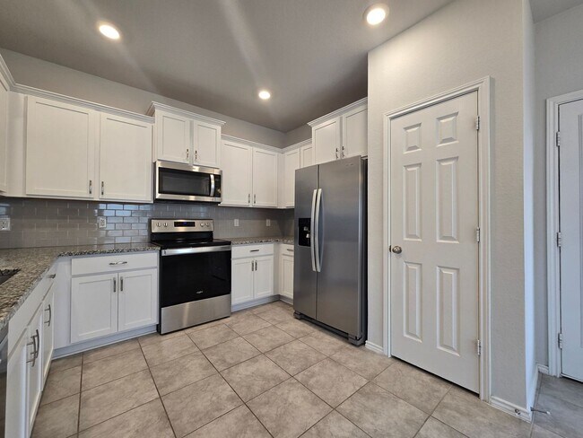 Building Photo - RENT REDUCTION - AVAILABLE NOW!