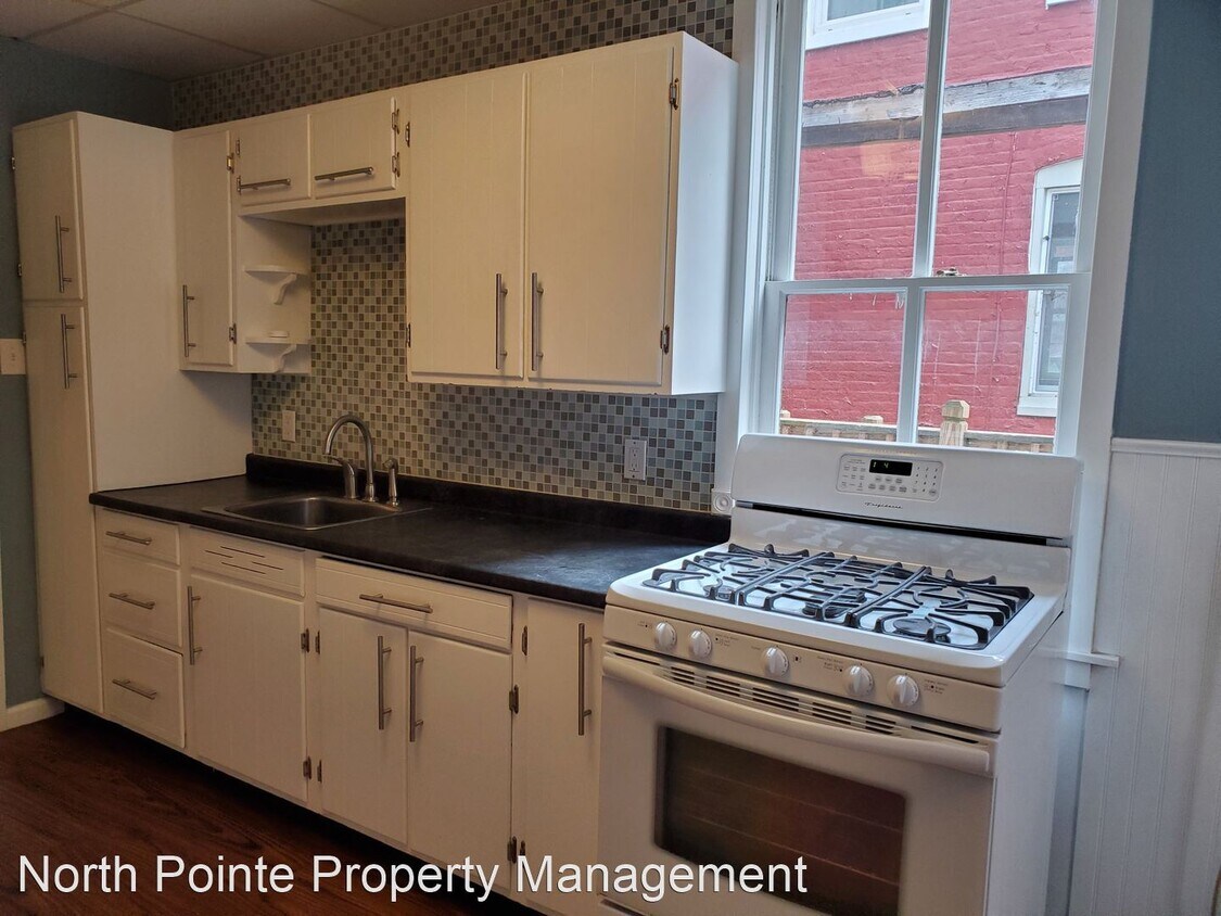 Foto principal - 4 br, 1 bath House - 220 W. Liberty St.
