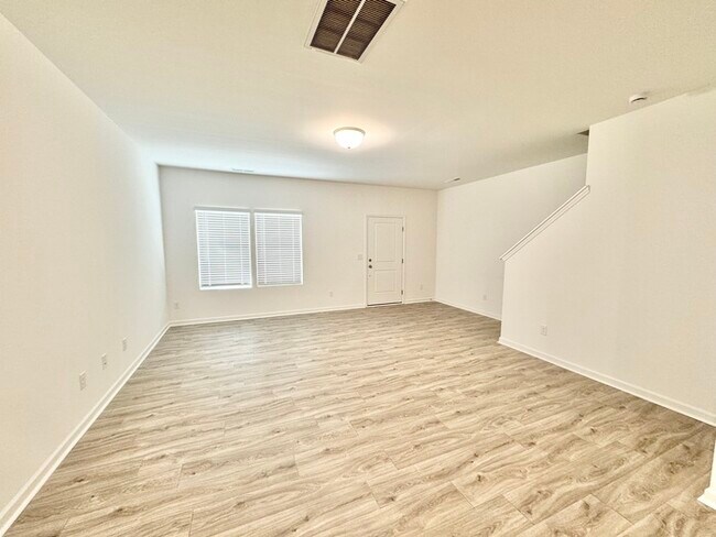 Building Photo - Three bedroom 2 1/2 bathroom townhome with...