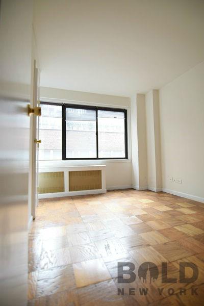 Building Photo - 230 E 44th St